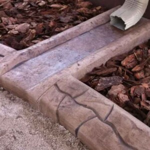 Custom Curbing integrated water spout